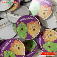 huy hiệu cài áo mica